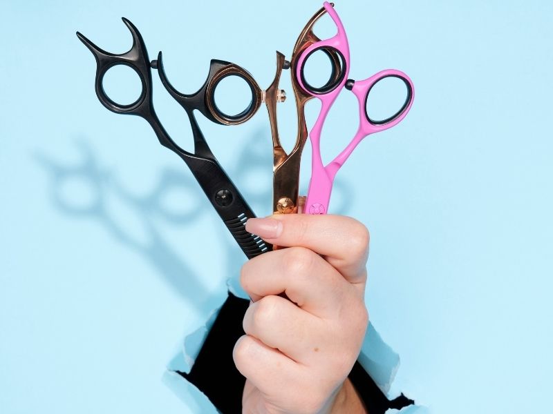 Different kinds of hairdressing scissor handles